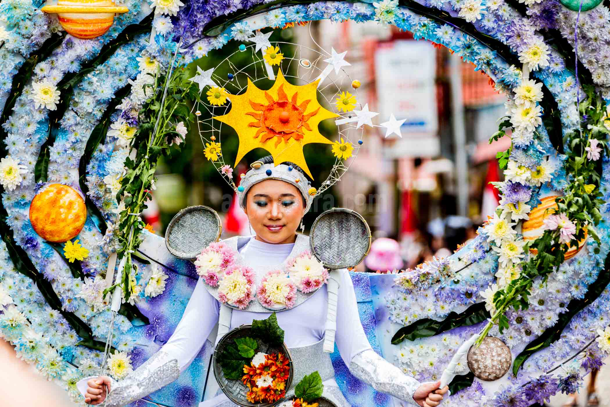 A Young Girl in chrysanthemum flower custom. She would performance at the Tomohon International Flower Festival (TIFF) 2024